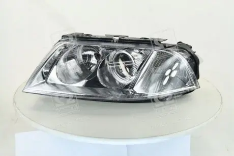 Фара лев. VW PASSAT B5 00-05 TYC 20-6244-05-2B