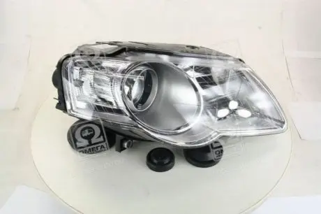 Фара прав. VW PASSAT B6 05- TYC 20-A733-05-2B