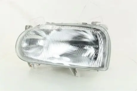 Фара лівий. VW GOLF III TYC 20-5018-08-2B