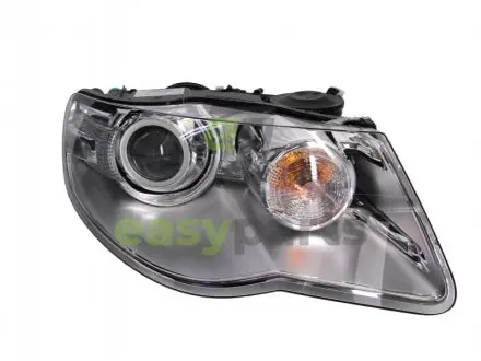 VW Фара основная Bi- Xenon без газоразр.лампы D1S/H7 прав.Touareg 02-10 HELLA 1ZS009452141