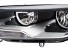 HELLA VW Фара основная галоген с мотором,с лампами H15 H7/H7 W5W WY21W лів.Touareg 10- 1EJ 010 328-211