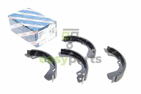 Колодки гальмівні (задні) Daihatsu Charade 88-92/Suzuki Liana/Swift 89-(барабанні) (200x32) BOSCH 0986487436