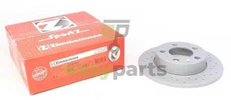 Диск гальмівний (задній) Skoda Fabia/Octavia/VW Golf IV 98- (230x9)(з покриттям, з отворами,повний) ZIMMERMANN 100.1236.52