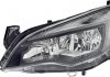 HELLA OPEL Фара основная галоген с лампами,мотором,H7/H7 W21/5W лів.Astra J 09- 1EG 010 011-311